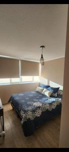 Ένα ή περισσότερα κρεβάτια σε δωμάτιο στο Hermoso Departamento