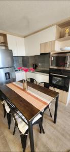 Η κουζίνα ή μικρή κουζίνα στο Hermoso Departamento +2 φωτογραφίες