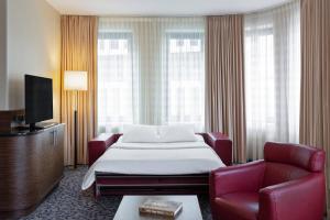 TV/trung tâm giải trí tại Courtyard by Marriott Vienna Prater/Messe