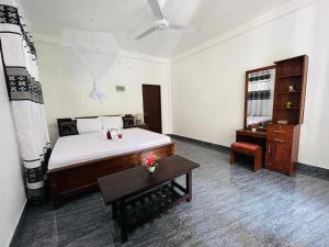 Postel nebo postele na pokoji v ubytování Dream Villa Sigiriya