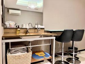 Kuchyň nebo kuchyňský kout v ubytování Hotel Square FujiGotemba