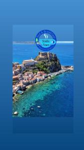 a view of a resort on a island in the ocean at B&B Scilla Town in Scilla +16 photos