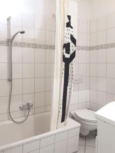 Koupelna v ubytování Mühlenpark 2 Mühlenpark Haus B Wo 7 + 10 fotografií