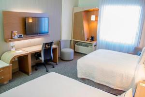 Postel nebo postele na pokoji v ubytování Courtyard by Marriott Fort Walton Beach-West Destin