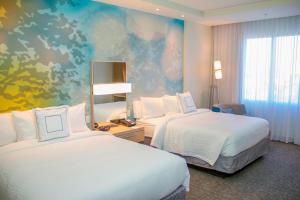 Postel nebo postele na pokoji v ubytování Courtyard by Marriott Fort Walton Beach-West Destin
