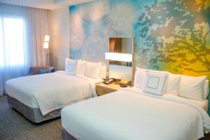 Postel nebo postele na pokoji v ubytování Courtyard by Marriott Fort Walton Beach-West Destin