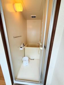 Koupelna v ubytování 高平ハウス Room203 + 11 fotografií