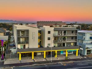 an overhead view of a city with a building at WINK Aparthotel Eaton Square in Cape Town