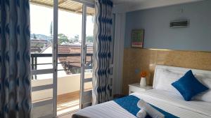 Postel nebo postele na pokoji v ubytování HUY HOANG II Hotel - Da Lat