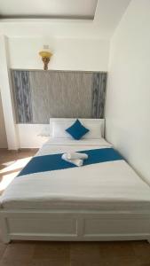 Postel nebo postele na pokoji v ubytování HUY HOANG II Hotel - Da Lat