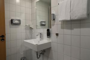 Koupelna v ubytování Hotel am Südtor + 37 fotografií