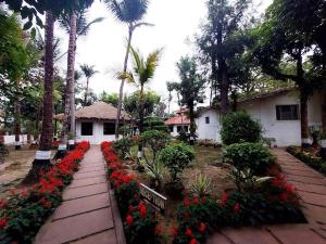 Zahrada ubytování Chhuti Holiday Resort