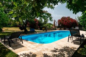 Bazén v ubytování Villa Marco Polo nebo v jeho okolí