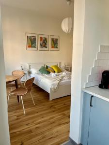 Posteľ alebo postele v izbe v ubytovaní Central City Retreat