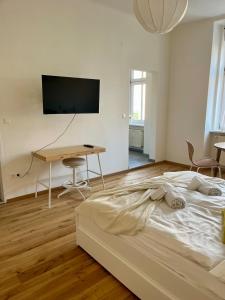 Posteľ alebo postele v izbe v ubytovaní Central City Retreat