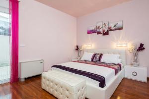 Posteľ alebo postele v izbe v ubytovaní Villa De Luxe