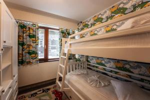 Postel nebo postele na pokoji v ubytování SILVER MOUNTAIN - ANA'S Apartments