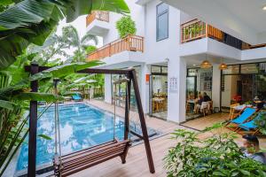 Bazén v ubytování Palm Riverside Boutique nebo v jeho okolí