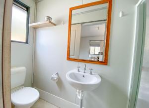 a bathroom with a sink and a toilet and a mirror at BIG4 Bridgetown in Bridgetown +40 photos