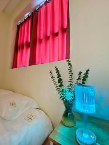 Postel nebo postele na pokoji v ubytování Home couple