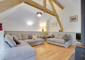 Posezení v ubytování Plym Cottage