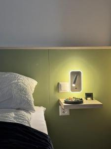 Postel nebo postele na pokoji v ubytování N's Hotel - Self-Check-in Hotel