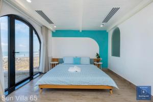 Postel nebo postele na pokoji v ubytování Sun Villa 65 - View Biển Trực Diện