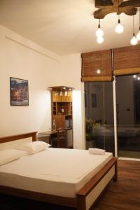 Postel nebo postele na pokoji v ubytování The Quale Villa