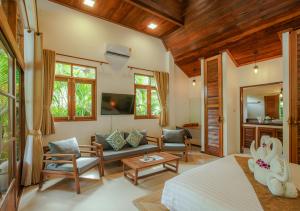 TV a/nebo společenská místnost v ubytování Amaya Boutique Resort