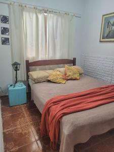 Ένα ή περισσότερα κρεβάτια σε δωμάτιο στο Casa térrea