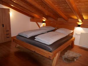 Postel nebo postele na pokoji v ubytování Das Bergnest
