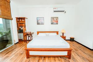 Postel nebo postele na pokoji v ubytování The Quale Villa