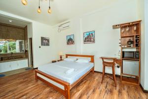 Postel nebo postele na pokoji v ubytování The Quale Villa