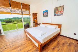 Postel nebo postele na pokoji v ubytování The Quale Villa