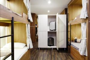 a room with bunk beds in a hostel at Barcelona & You Hostel Sagrada Familia in Barcelona