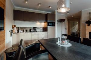 A kitchen or kitchenette at Residenz JANET by MoniCare