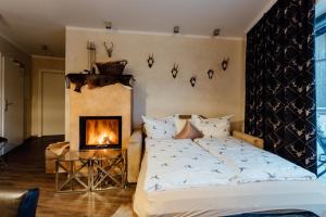A bed or beds in a room at Residenz JANET by MoniCare
