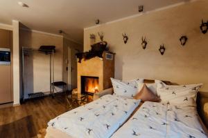 A bed or beds in a room at Residenz JANET by MoniCare