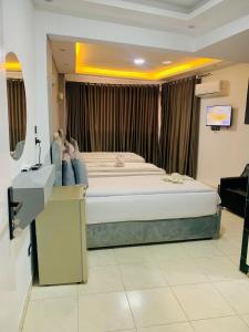 Voodi või voodid majutusasutuse NADA - HOTEl toas
