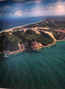 an aerial view of an island in the ocean at Suite Vista al mar in Natal
