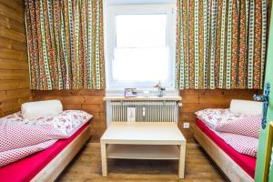 Łóżko lub łóżka w pokoju w obiekcie Appartement Amalie by MoniCare