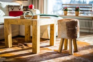 A seating area at Haus Cervelli by MoniCare