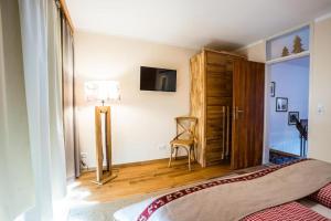 A bed or beds in a room at Haus Cervelli by MoniCare
