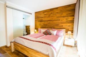 A bed or beds in a room at Haus Cervelli by MoniCare