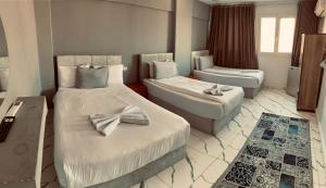 Voodi või voodid majutusasutuse NADA - HOTEl toas
