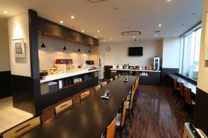 TV a/nebo společenská místnost v ubytování AB Hotel Okazaki