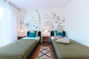 Giường trong phòng chung tại La Caulnaise - Maison climatisée avec terrasse