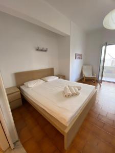 Ένα ή περισσότερα κρεβάτια σε δωμάτιο στο My sea apartments NEW