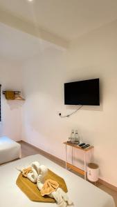 TV a/nebo společenská místnost v ubytování SWM Hotel