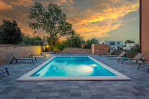 La pileta dentro o cerca de Apartments Cesare with Shared Pool